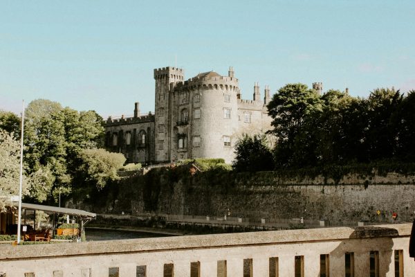 a large castle with a clock on the side of it